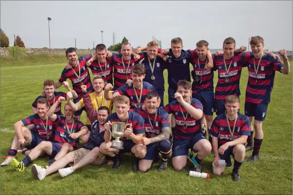  ??  ?? The Dearg Celtic side celebrate their Charlie Byrne Cup final victory over Shamrock Celtic in Celtic Park in Arklow. Photos: Paul Messitt