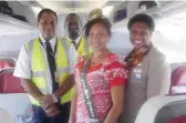  ??  ?? Flying high: Miss Papua New Guinea, Grace Nugi, on board with Air Niugini (above); with the other contestant­s in Samoa (top); and proudly wearing her Miss PNG sash (right).