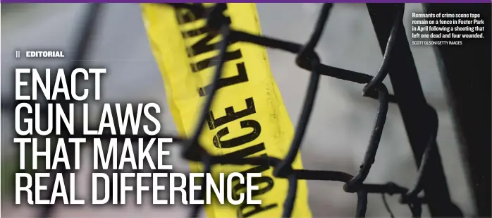  ?? SCOTT OLSON/ GETTY IMAGES ?? Remnants of crime scene tape remain on a fence in Foster Park in April following a shooting that left one dead and four wounded.