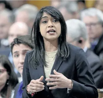  ?? ADRIAN WYLD/THE CANADIAN PRESS ?? Government House Leader Bardish Chagger answers a question during Question Period in the House of Commons in Ottawa, April 11. The Trudeau government is backing down from some of its most controvers­ial proposals for reforming the way the House of...