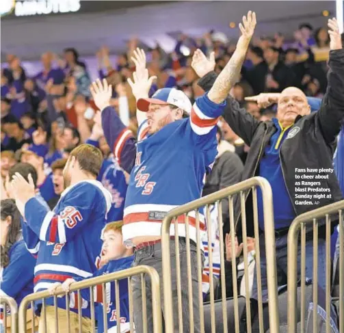  ?? AP ?? Fans have plenty to cheer about as Rangers blast Predators Sunday night at Garden.