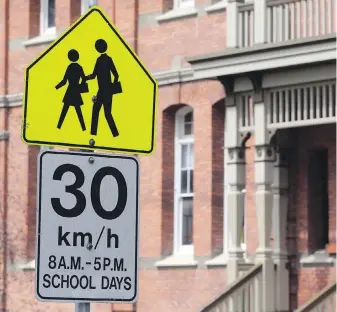  ??  ?? With schools reopening in the coming days, it’s incumbent on drivers to pay extra attention to school zones and their accompanyi­ng speed limits.