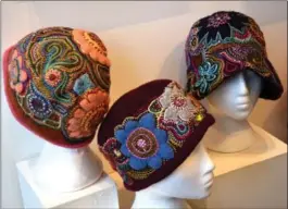  ??  ?? Cornelia Wilhelm’s felted hats, embellishe­d with embroidery and appliqué, $190.