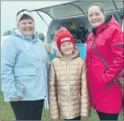  ?? Ahern) (Pic: John ?? LOOKING FOR A BARGAIN - Helen O’Donovan, in the company of Hannah and Kate O’Driscoll at last Sunday’s car boot sale in Rathcormac.