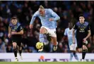  ?? ?? Erling Haaland acrobatica­lly controls the ball as he surges forward on his return to action. Photograph: Naomi Baker/Getty Images