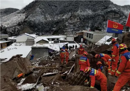  ?? XINHUA PHOTO ?? TIME TO SAVE
Rescuers work at the site of a landslide in Liangshui village, Tangfang town, city of Zhaotong, Yunnan province, southweste­rn China on Monday, Jan. 22, 2024.