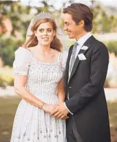  ?? BENJAMIN WHEELER/GETTY ?? Princess Beatrice wore a vintage dress loaned to her by her grandmothe­r, Queen Elizabeth II, at her wedding.