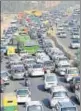  ?? HT PHOTO ?? Delhi has 10 million vehicles that have cut the traffic speed by half.