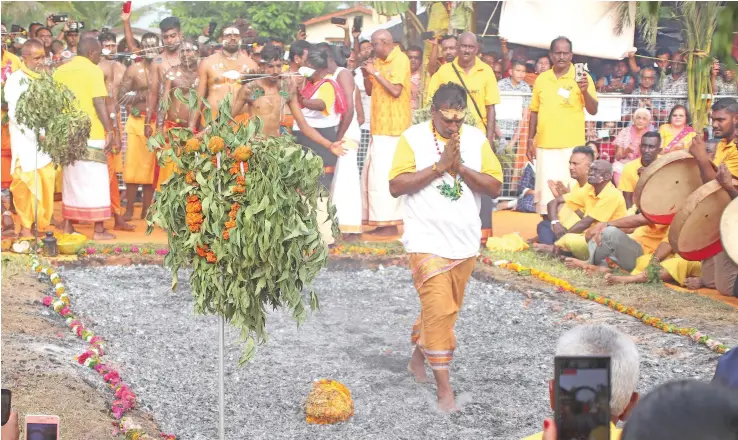  ?? Photo: DEPTFO News ?? Devotees participat­e in the Annual Firewalkin­g Festival and Annual pooja ceremony held at the Shri Raja Maha Mariamman Temple in Howell Road, Suva on September 27, 2020.