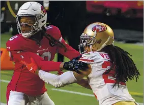  ?? JENNIFER STEWART — THE ASSOCIATED PRESS ?? Cardinals wide receiver DeAndre Hopkins, left, battles with 49ers cornerback Jason Verrett.