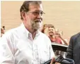  ?? Foto: dpa ?? Ankunft am alten Amt: Mariano Rajoy tritt seinen Dienst an.