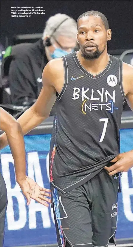  ?? AP ?? Kevin Durant returns to court for Nets, checking in for Alize Johnson (24) in second quarter Wednesday night in Brooklyn.