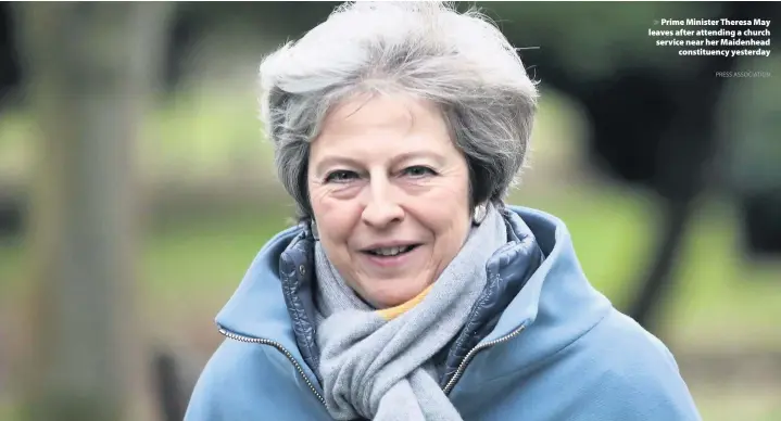  ?? PRESS ASSOCIATIO­N ?? &gt; Prime Minister Theresa May leaves after attending a church service near her Maidenhead constituen­cy yesterday