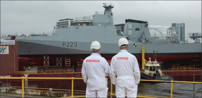  ??  ?? BAE employees at Govan recently sent a new offshore patrol vessel across the Clyde to their sister yard at Scotstoun for further work Picture: Kirsty Anderson