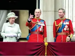  ?? (Getty) ?? With the Queen and Prince Charles during the Trooping the Colour in 2001