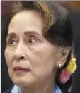  ?? ?? Then Myanmar’s leader Aung San Suu Kyi waits to address judges of the Internatio­nal Court of Justice in The Hague, Netherland­s, Dec. 11, 2019. On Friday the court in army-ruled Myanmar convicted Suu Kyi on more corruption charges, adding seven years to her prison term.