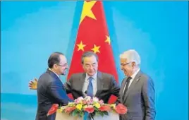  ?? AP ?? (From left) Afghanista­n foreign minister Salahuddin Rabbani, Chinese foreign minister Wang Yi and Pakistan foreign minister Khawaja Asif in Beijing on Tuesday.