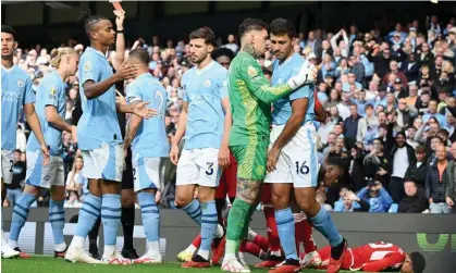  ?? ?? Rodri is shown a red card against Nottingham Forest to earn a three-match ban. Photograph: Michael Regan/Getty Images