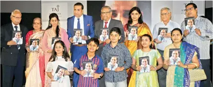  ??  ?? VVS Laxman poses with his family during the book release function of 281 And Beyond in Hyderabad on Thursday.