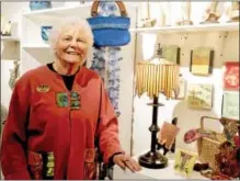  ?? PHOTO PROVIDED ?? Community volunteer Pat Carlson directs the annual holiday shop at The Arts Center of the Capital Region in downtown Troy.