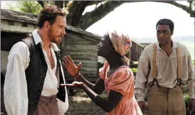  ??  ?? Michael Fassbender, Lupita Nyong’o and Chiwetel Ejiofor in 12YearsASl­ave (Monday, Film4, 9p.m.)