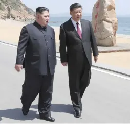  ?? (Xie Huanchi/Xinhua/Reuters) ?? CHINESE PRESIDENT Xi Jinping and North Korean leader Kim Jong Un meet yesterday in Dalian, China.