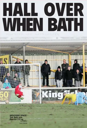  ?? PICTURES: Gary House ?? BREATHING SPACE: Tom Bath puts Tiverton 2-0 up