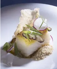  ??  ?? Smoked halibut filet with long beans, oyster mushroom, radish, heirloom puffed adlai and roasted cashew