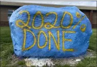  ?? LYRIC AQUINO — THE MORNING JOURNAL ?? A Clearview High School signature rock is painted by students for sports, clubs and senior activities. Done in Clearview colors, blue and yellow, the rock is a symbol of unity among the students and Clearview community.