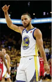  ?? GETTY IMAGES ?? Stephen Curry scored 35 points with five 3-pointers as the Warriors beat the Rockets 126-85 on Sunday night for a 2-1 lead in the Western Conference finals.