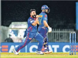  ?? BCCI ?? Amit Mishra of Delhi Capitals celebrates the wicket of Hardik Pandya of Mumbai Indians during their IPL match in Chennai on Tuesday. Mishra also bagged the key wickets of Rohit Sharma, Ishan Kishan and Kieron Pollard to help restrict the defending champions to 137 in 20 overs.