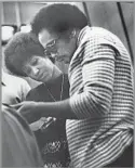  ?? David Redfern Redferns / Getty Images ?? IN THE STUDIO Producer Quincy Jones confers with Franklin in a recording studio in 1973.
