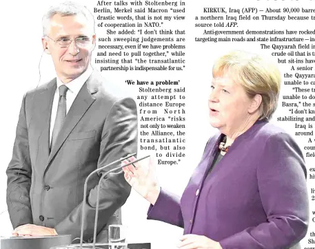  ?? AFP ?? GERMAN Chancellor Angela Merkel (right) and NATO Secretary-General Jens Stoltenber­g face the media and the world in Berlin on Thursday.