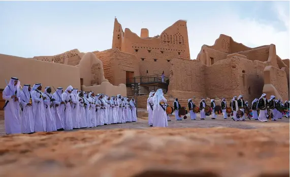  ?? Supplied ?? Main and right: Saudi Tourism Minister Ahmed Al-Khateeb inaugurate­s the historic AtTuraif and Bujairi neighborho­ods with a dramatic ceremony witnessed by guests from around the world.