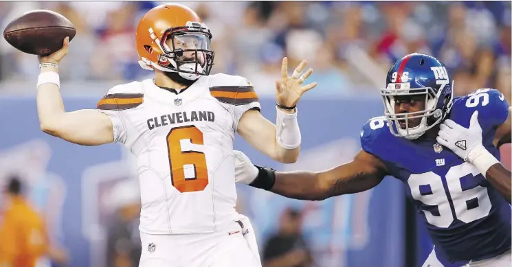  ?? THE ASSOCIATED PRESS ?? Cleveland Browns quarterbac­k Baker Mayfield looked good against Kareem Martin and the New York Giants last week, but he has yet to face first-string defenders.