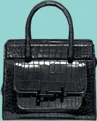  ??  ?? Stamped leather handbag, $2,810, from Tod’s.