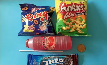  ?? PHOTO: ELEANOR BLACK/STUFF ?? The ‘‘lunch pack’’ $2 buys you from one shop in Glen Innes, Auckland.