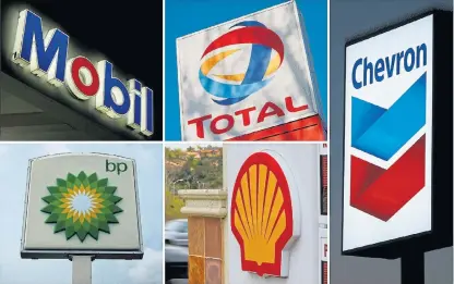  ?? /Reuters ?? Time for change: Five of the largest publicly traded oil companies in the world: BP, Chevron, Exxon Mobil, Royal Dutch Shell, and Total. European companies are moving away from a century-old reliance on oil, while their US counterpar­ts are largely staying committed to oil and gas.