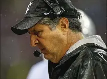  ?? OTTO GREULE JR. — GETTY IMAGES ?? Washington State coach Mike Leach, the architect of the vaunted Air Raid offense, has been one of the all-time great hires in the Pac-12.