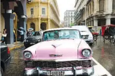  ??  ?? Virginia Governor McAuliffe drives a 1956 Chevy Bel Air named Lola.