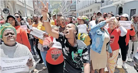  ?? | PHANDO JIKELO African News Agency (ANA) ?? ANC Youth League supporters picketed outside the Western Cape High Court yesterday after the release of Chris Hani’s killer Janusz Waluś on parole by the Constituti­onal Court earlier this week. The picket was to highlight their anger and frustratio­n, accusing the country’s justice system and Chief Justice Raymond Zondo of prioritisi­ng the killer more than Hani’s family.