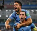  ?? GETTY IMAGES ?? Diego Godin will anchor Uruguay’s defense, and Luis Suarez (top) will try to torment France’s back line as the two countries meet Friday.