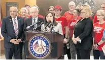  ?? GRAY ROHRER/ORLANDO SENTINEL ?? Sen. Lori Berman, flanked by fellow Democrats and gun control advocates, unveils her bill Thursday to expand the red flag law to allow family members to petition the court to take away guns of those deemed a threat to themselves or others.