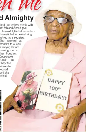  ?? NATHANIEL STEWART PHOTOS ?? Centenaria­n Violet Mitchell of Chapelton Clarendon, with a birthday card that she received on her 100th birthday.