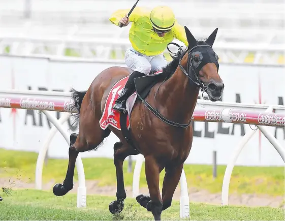  ?? Picture: JULIAN SMITH/AAP ?? Jockey Luke Currie rides Manuel to victory in the Orr Stakes at Caulfield in February.