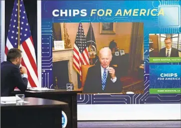  ?? Susan Walsh Associated Press ?? PRESIDENT BIDEN, who continues to recover from his coronaviru­s infection, speaks virtually with business executives and labor leaders to discuss the Chips Act during an event on Monday at the White House complex.