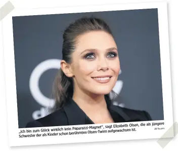  ?? Reuters ?? die als jüngere sagt Elizabeth Olsen, kein Paparazzi-Magnet“, „Ich bin zum Glück wirklich Twins aufgewachs­en ist. schon berühmten Olsen- Schwester der als Kinder