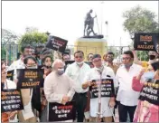  ??  ?? Intellectu­als including Kabir Suman, Indranil Sen, Bratya Basu and Suvaprasan­na amongst others held a silent protest at Gandhi Statue, in Kolkata, on Sunday