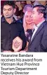  ??  ?? Yasaratne Bandara receives his award from Vietnam Hue Province Tourism Department Deputy Director