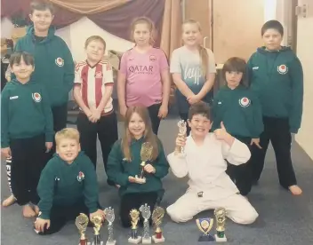  ??  ?? Students from the Rickleton Gethsemane Revival Centre judo class with their trophies.